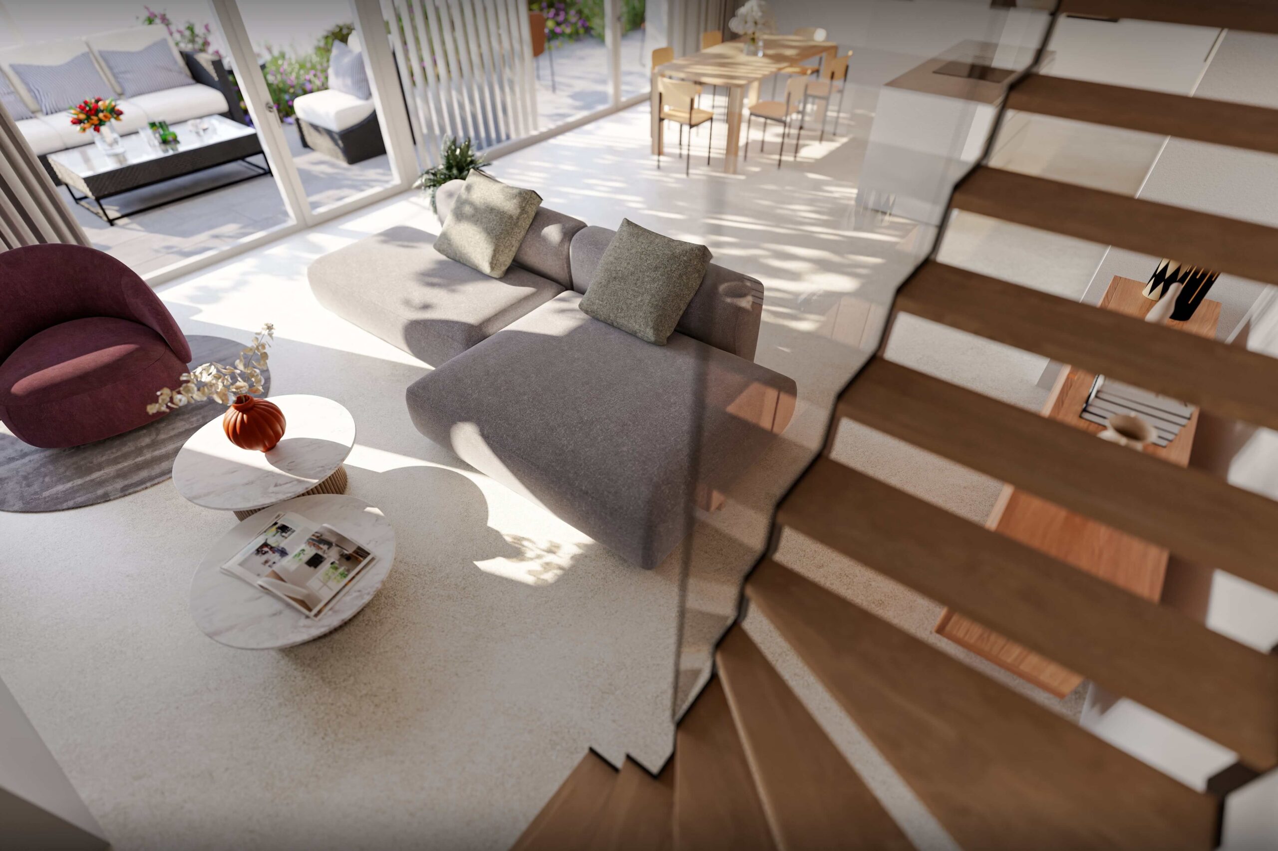 Blick von der Treppe in den hellen Wohn- und Essbereich des Projekts Biel-Benken Panorama der Ernst Frey AG. Das moderne Interieur mit großzügiger Fensterfront, Designer-Möbeln und direktem Zugang zur Terrasse vermittelt ein offenes, lichtdurchflutetes Wohngefühl mit harmonischer Verbindung von Innen- und Außenraum.